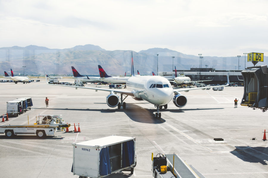 airplanes through an airport window infertility is like an airport